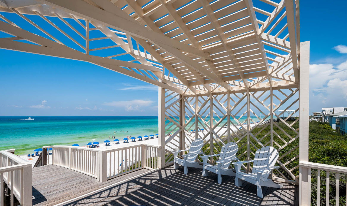 Shaded coastal porch overlooking turquoise water