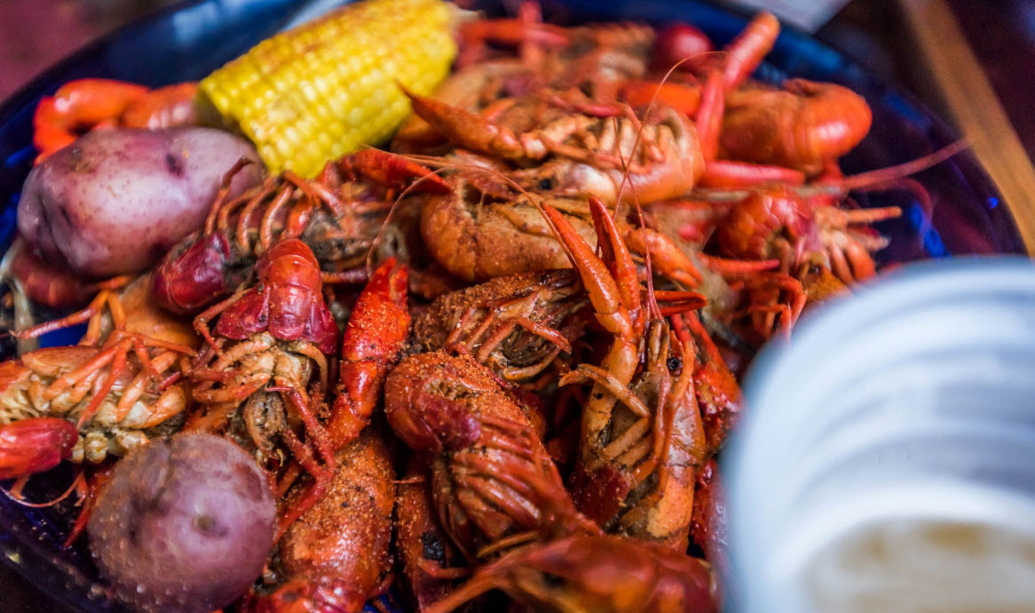 Crawfish boil with corn, potatoes, and sausage